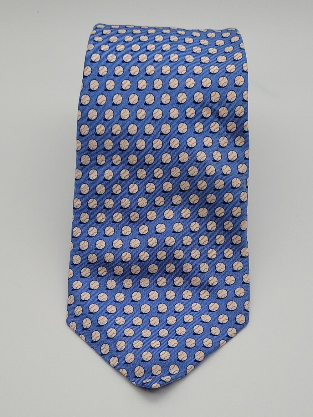 Vineyard Vines baseball-patterned silk necktie.